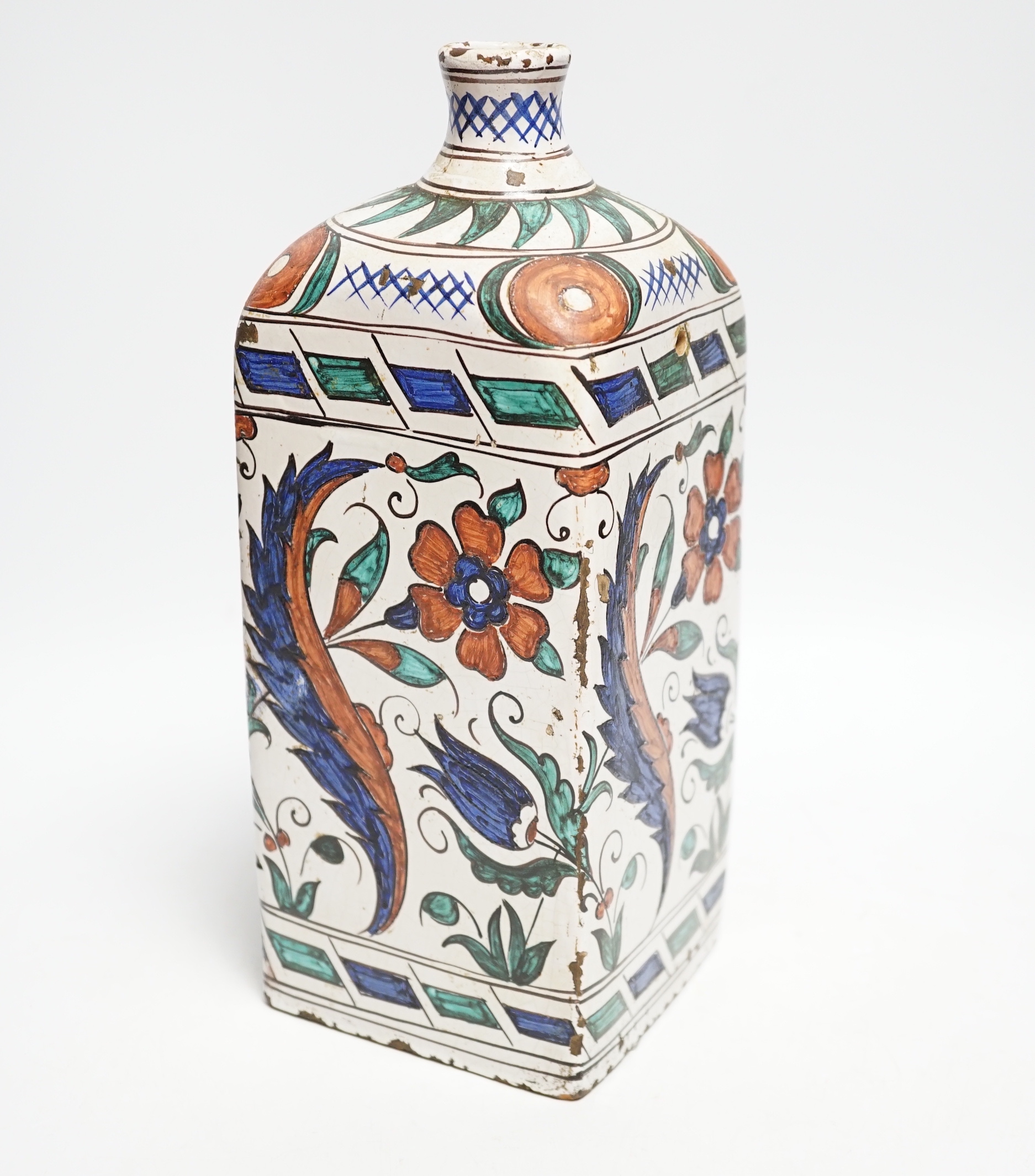 An Iznik style tin glazed flask, 28cm